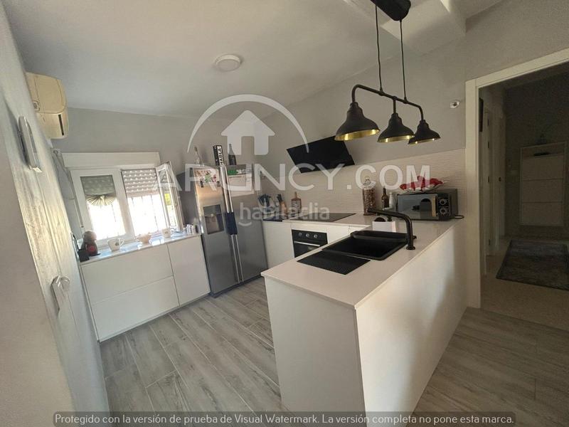 Foto f49cf442-5179-41a5-b156-c798945f2114. Casa a schiera con riscaldamento parcheggio piscina in Alcalá de Guadaira