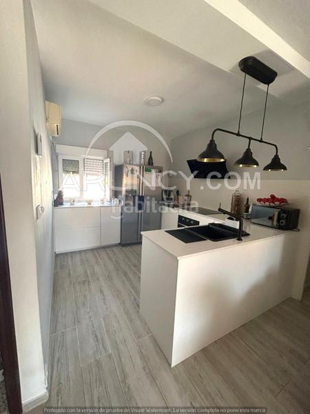 Foto f64a0c01-5aba-459d-a6dd-44298d254c32. Casa a schiera con riscaldamento parcheggio piscina in Alcalá de Guadaira