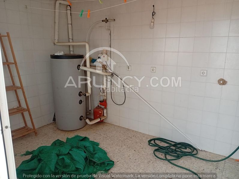 Foto e7ef49c0-03fc-4a2f-978f-e49ba14b7b8f. Casa amb calefacció a Centro Alcalá de Guadaira