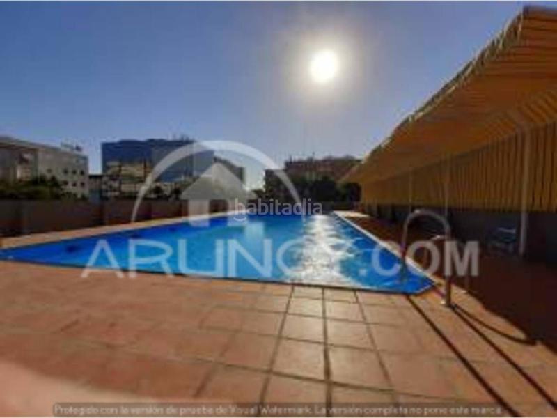 Foto 7c7a236c-b892-4e53-8443-ccd47ab0efba. Lloguer pis amb calefacció piscina a La Buhaira Sevilla