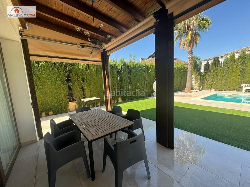 Foto c78426f2-f0b8-4457-addb-17416134196e. Chalet mit parking pool in El Zaudín - Club de Golf Bormujos