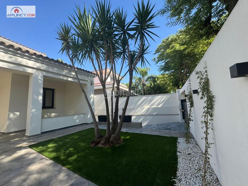 Foto f79938f5-e77c-4cde-a452-e53a44eb58ec. Chalet mit parking pool in El Zaudín - Club de Golf Bormujos