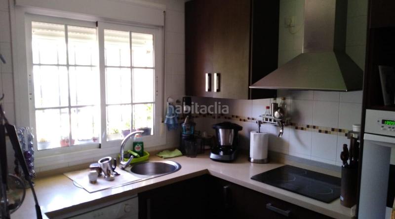 Foto d77190bc-8743-4c54-be92-303e589fb6c9. Maison jumelée avec parking dans La Barrosa Chiclana de la Frontera