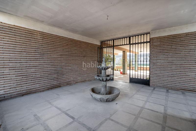 Foto 47073a85-07b7-4df9-8e7e-54263442def0. Masía casa con terreno y nave en Santa Fe