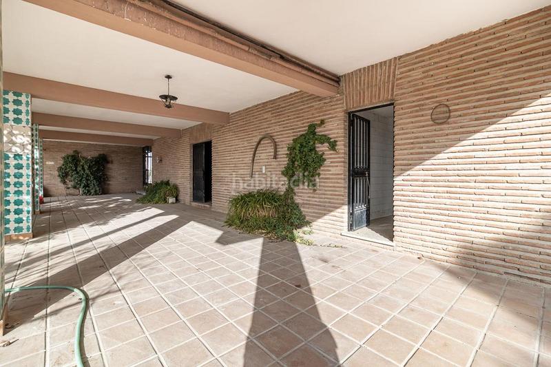 Foto e6324070-e382-4ae5-b340-c505a6bfe2fe. Masía casa con terreno y nave en Santa Fe