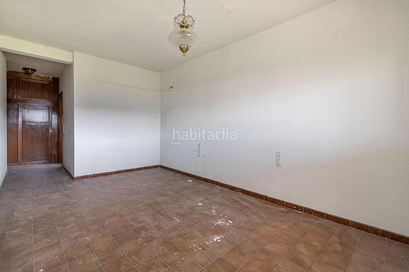 Foto e74731da-57b4-4c76-ae55-d89f1613d1c1. Masía casa con terreno y nave en Santa Fe