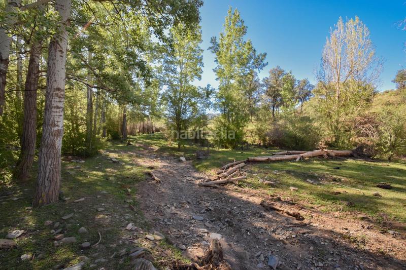 Foto b9cc5583-8955-49a0-b6f9-d689ad1d8582. Finca rústica parcela rústica con proyecto de explotación ganadera y nave de aperos 14,63 ha en Lugros