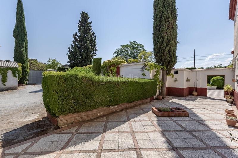 Foto b3bb6162-cd99-405a-ab73-db7a4411e5a5. Masia amb aparcament a Fargue Granada