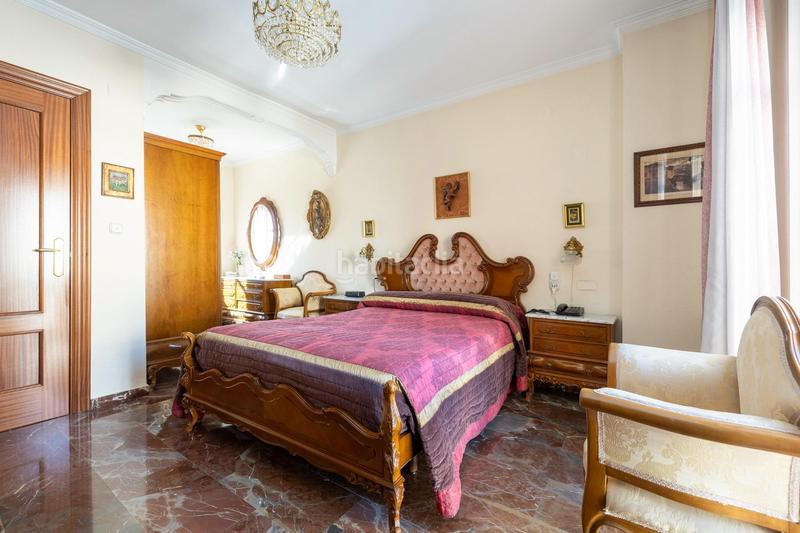 Foto 53c312b8-542b-4ce7-93de-0130fe9fb237. Casa adosada espectacular casa ubicada en el exclusivo barrio de albayda, diseñada con una distribución funcional en Granada