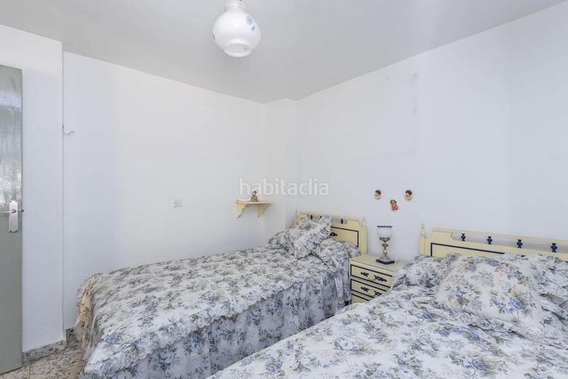 Foto 190036e2-c7d1-414e-8e46-02b8cfec5da8. Casa aparellada a Güéjar Sierra