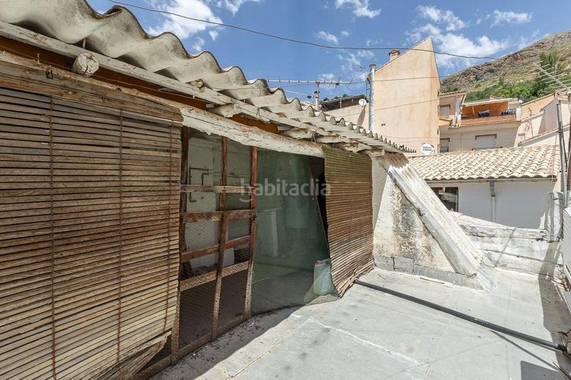 Foto 399a82cf-c5cb-413e-be69-66ae3236bb13. Casa aparellada a Güéjar Sierra