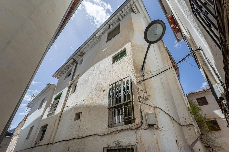 Foto 5291b2a5-e70e-4107-a8f5-5e8c89ae7e12. Casa aparellada a Güéjar Sierra