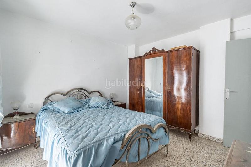 Foto bb9d5037-b979-4df2-90fa-a35390683914. Casa aparellada a Güéjar Sierra