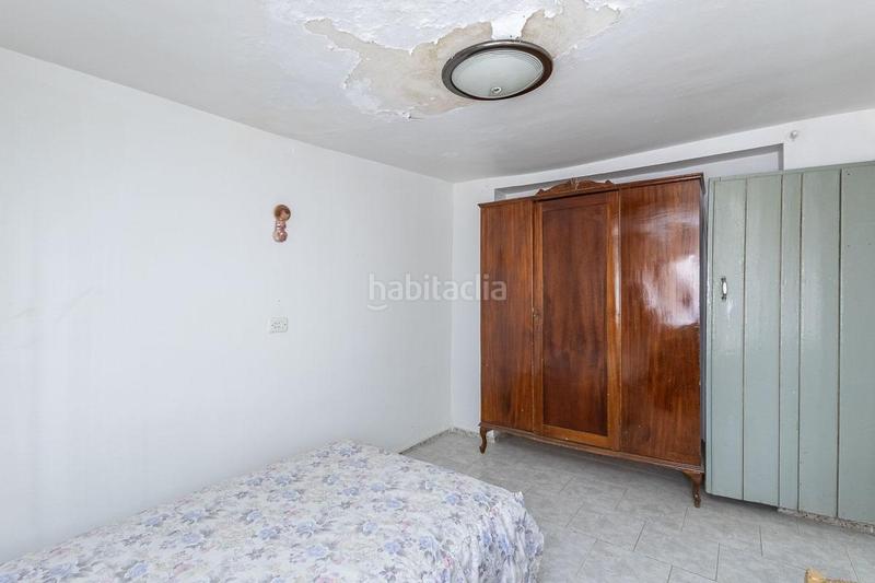 Foto edea5ee8-eedf-4cc4-81f0-a60a0dd597ec. Casa aparellada a Güéjar Sierra