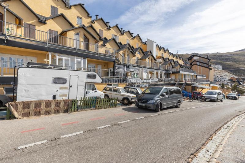 Foto 0ea2ec51-4188-48a2-b758-21d5fd34a4b4. Zweistöckige wohnung in urbanizacion de sol y nieve 74 in Sierra Nevada