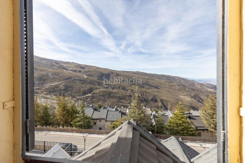 Foto 13738e70-a8c3-4b04-b3f6-71e72399dfbc. Zweistöckige wohnung in urbanizacion de sol y nieve 74 in Sierra Nevada