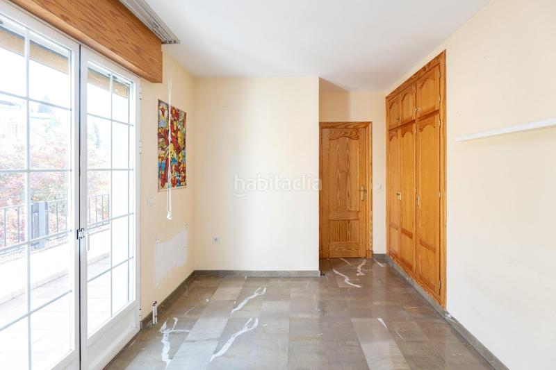 Foto c87e26ec-e492-4621-a11d-6c5272ce6914. Casa aparellada amb aparcament a Alfacar