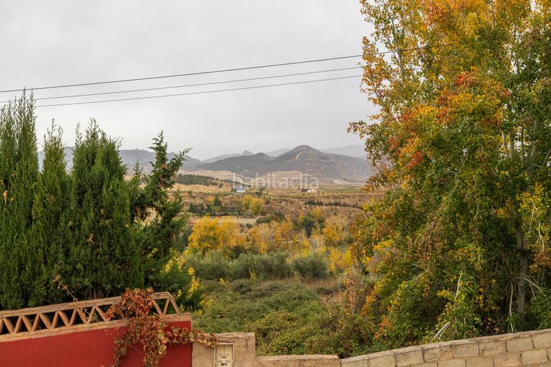 Foto f831d443-5f61-4735-a60c-8d229d920257. Masia amb aparcament a Dílar