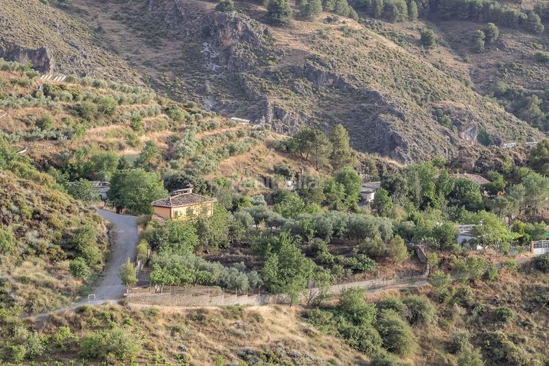 Foto d08b073f-114a-401e-8c35-77608f03e4bc. Masia amb piscina a Monachil pueblo Monachil