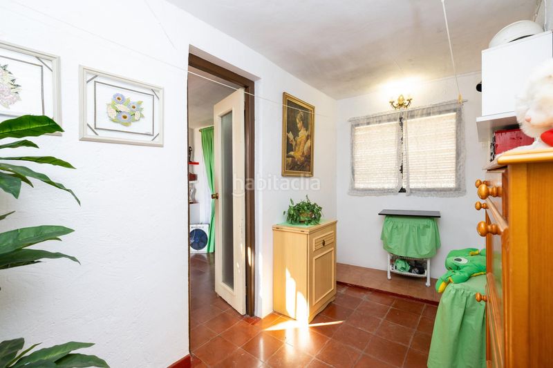 Foto 23d5ca15-8ed7-4473-9f10-c6838f432e99. Casa adossada a Loja