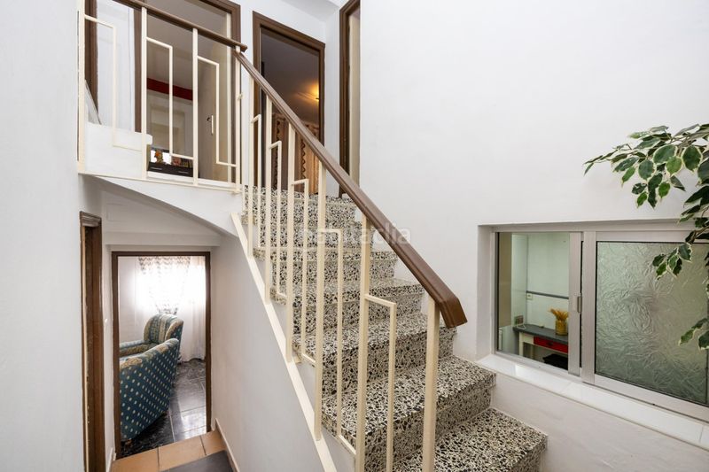 Foto 37a6d390-1865-4bec-8d72-7d194eecd85c. Casa adossada a Loja