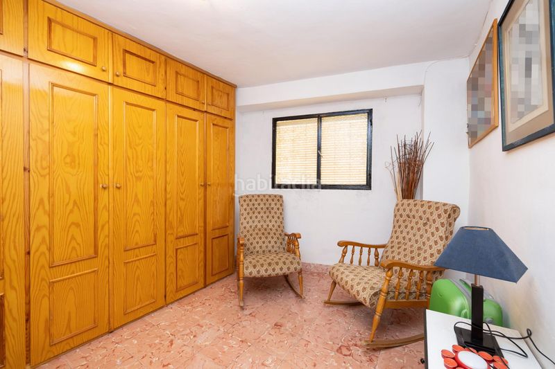 Foto 45badd2e-bf13-43c7-9ebd-05b9a66eabe1. Casa adossada a Loja