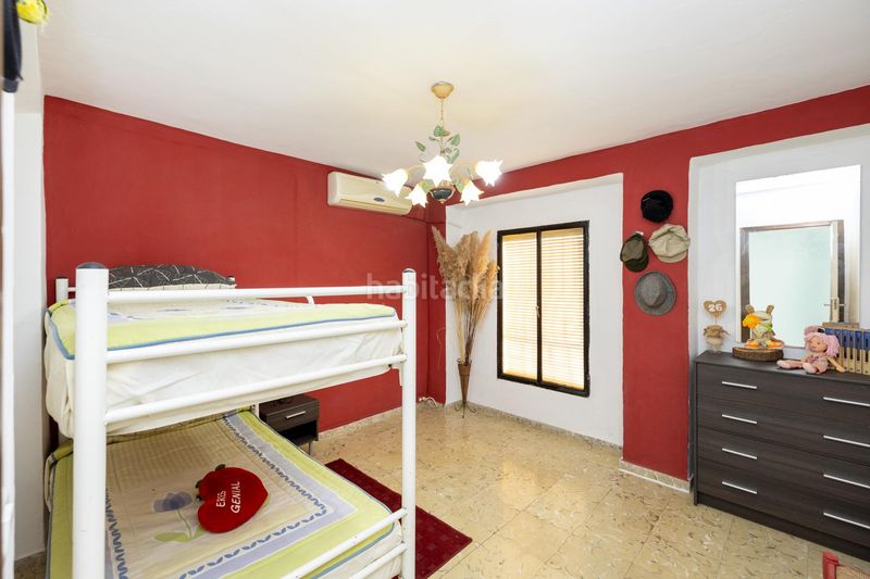 Foto 54ec2a55-075b-487d-8245-e10ed050baaf. Casa adossada a Loja