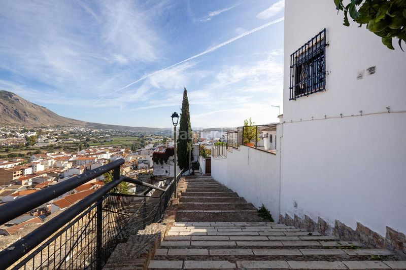 Foto 568a1e25-65f9-4d2d-983e-1a55da01f83a. Casa adossada a Loja