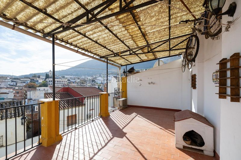 Foto aac7a50b-f094-42d9-a370-863e72ace65b. Casa adossada a Loja