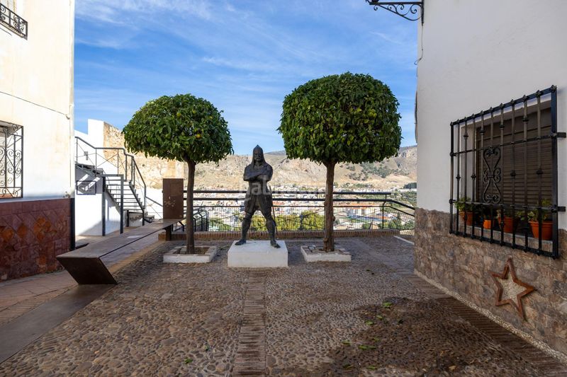 Foto d5880734-08d5-43bd-9548-24765091758e. Casa adossada a Loja