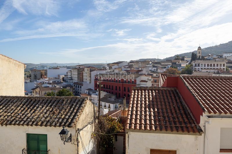 Foto f10fa93b-0a61-4ac1-9827-cc6314d93d52. Casa adossada a Loja