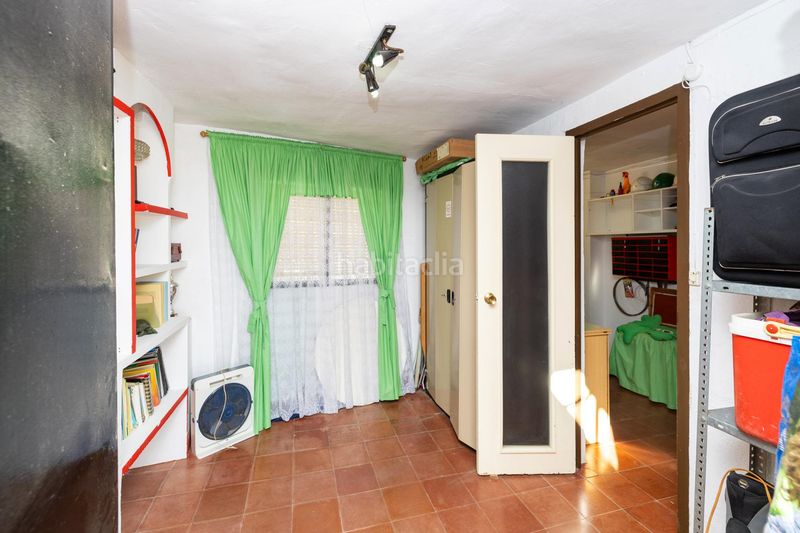 Foto f63552c2-44b1-4120-a061-b9fd8896ebeb. Casa adossada a Loja