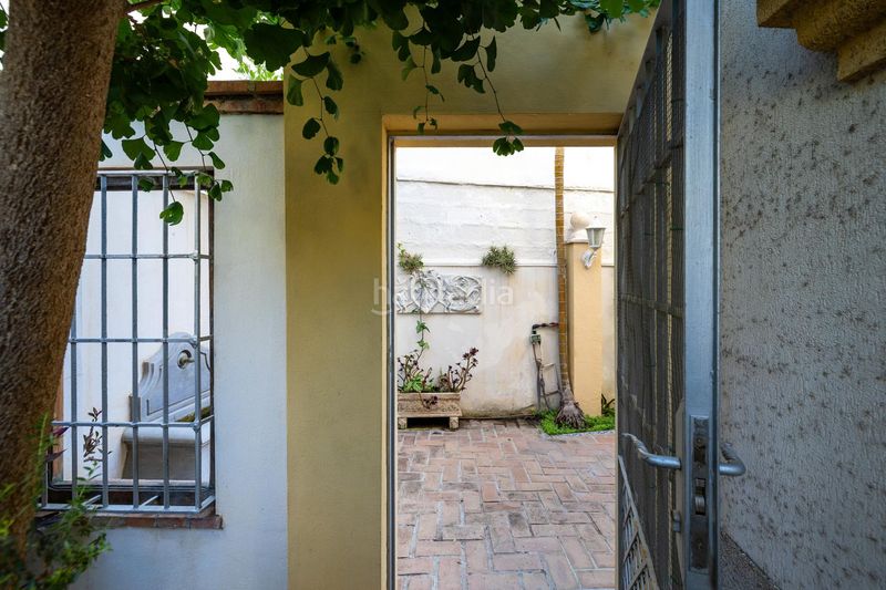 Foto 87583b60-477f-4ba5-a133-a60740e7be75. Casa adosada espectacular vivienda pareada con jardín, terraza 360º y garaje en zona residencial céntrica en Motril