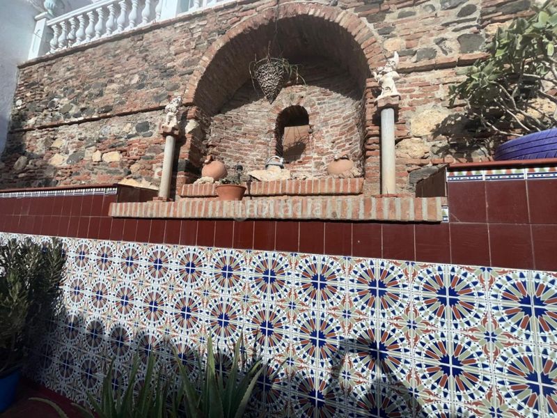 Foto 9cf8d0bc-d458-44c3-b4bc-9ddb45c4b96a. Masia amb aparcament a Centro Histórico Vélez - Málaga