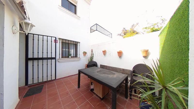 Foto bf030b61-1d6c-4625-ae01-fda27b2c73d1. Casa aparellada amb piscina a Caleta de Velez