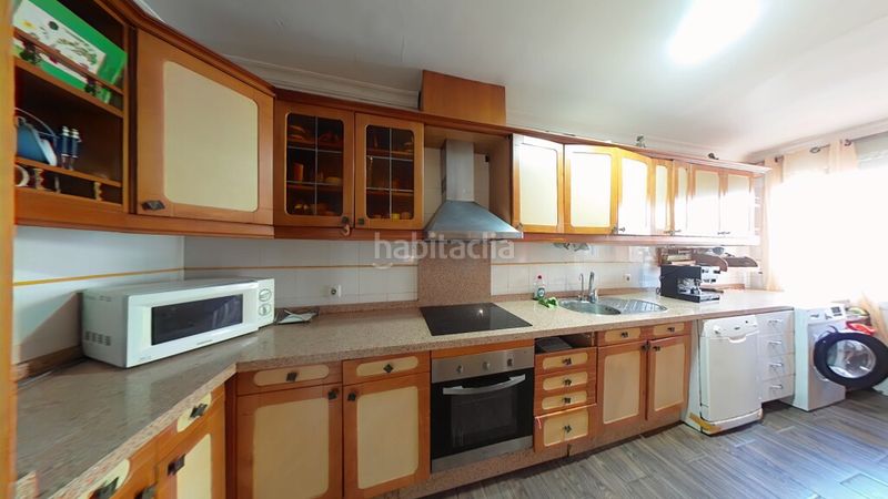 Foto 5389f029-e8c7-41b8-bbfb-666b4d5c57f5. Casa aparellada amb aparcament a Capistrano Nerja