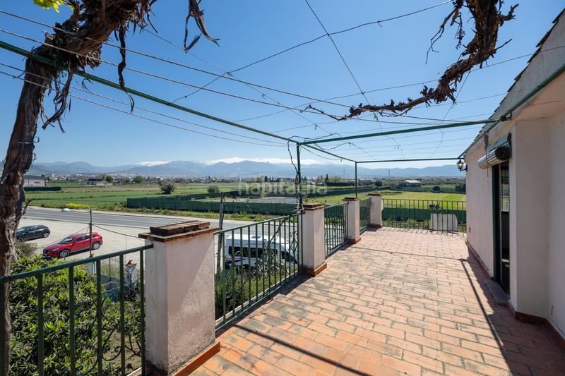 Foto 29e46d3a-53f3-430c-b474-008d3e46edb0. Masia amb aparcament a Poniente Armilla