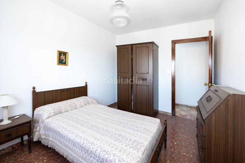 Foto 3adf4fb5-3638-4f18-9c5a-f7b0967ce6eb. Piso  rector marín ocete de cuatro dormitorios con garaje. en Granada