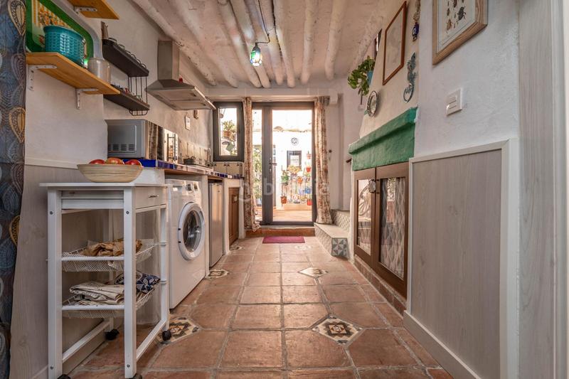 Foto 84a6d7a5-d851-44a0-828d-41a484d15eaf. Casa adossada amb calefacció a Nigüelas