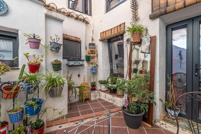 Foto a50f2d5d-ed1c-4d0e-b191-be243f91554b. Casa adossada amb calefacció a Nigüelas