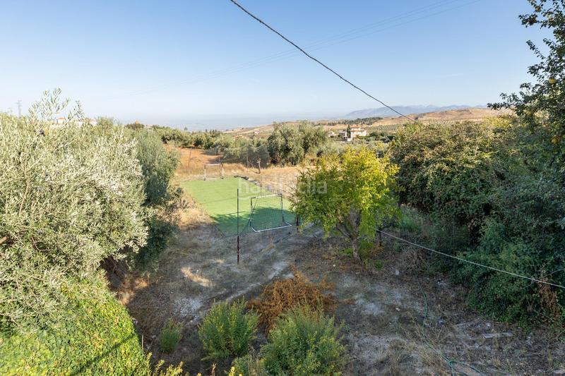 Foto 346c4360-84d3-482c-8f74-102d8b07702d. Xalet amb calefacció aparcament piscina a Dílar