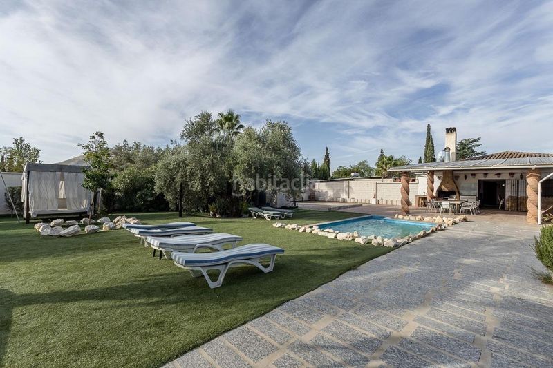 Foto 265241d8-1b0f-4f7e-a379-68fc15b2a2d7. Masia amb piscina a Atarfe