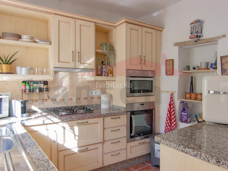 Foto ad83cdcf-cef9-416c-b0cb-4d0424dccd67. Casa adosada casa de pueblo en Benamocarra
