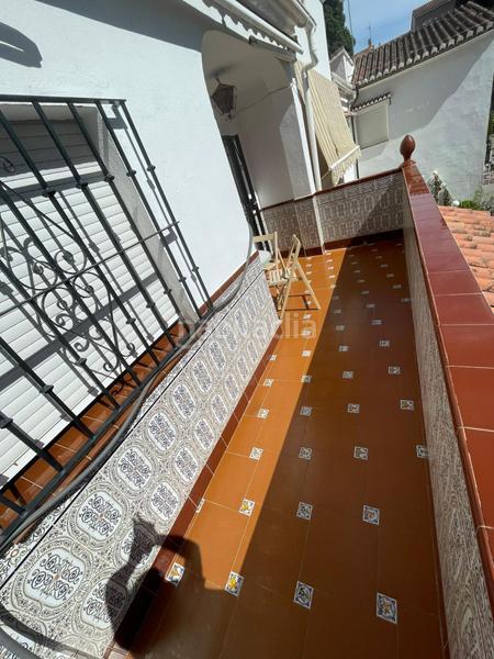 Foto ab448392-dd25-4dcb-b286-027e00c1b6e6. Casa pareada el coto pareada con encanto de 3 dormitorios con patio 40 m2 y sótano en Mijas