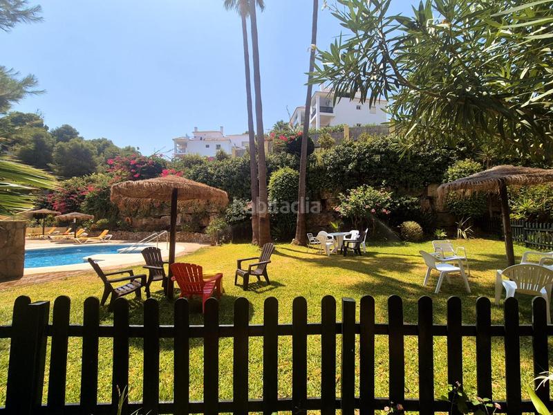 Foto d5cbf0c8-3d28-4cc9-b55d-7c80f093438f. Ático Riviera del Sol ático, 2 dormitorios, terraza, piscina y jardín en Mijas