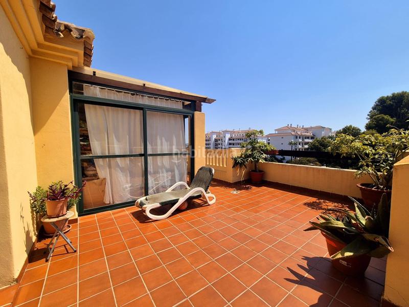 Foto f811194f-9eaa-4c26-8a26-583f0a17a426. Ático Riviera del Sol ático, 2 dormitorios, terraza, piscina y jardín en Mijas