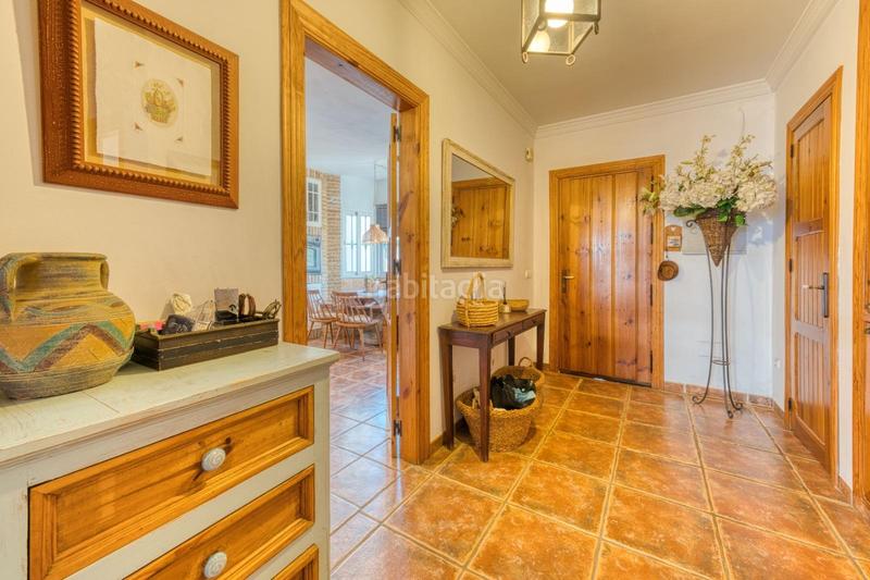 Foto 6412a314-60eb-4aa5-9ccc-6e8a2f690c57. House with heating parking in Playa de los Boliches Fuengirola