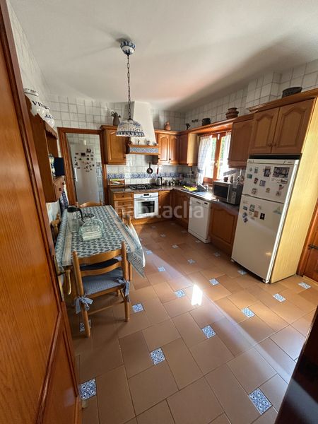 Foto 04d90f5f-fd3a-470b-b324-d79d0a82748a. Casa aparellada amb xemeneia calefacció aparcament piscina a Vélez - Málaga