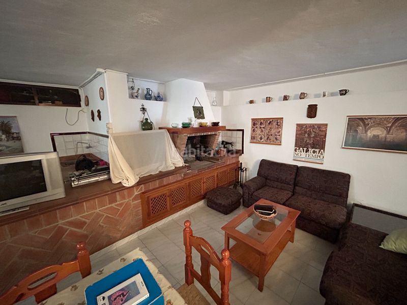 Foto 173be677-9cb2-4aae-8805-809f181b525b. Casa aparellada amb xemeneia calefacció aparcament piscina a Vélez - Málaga