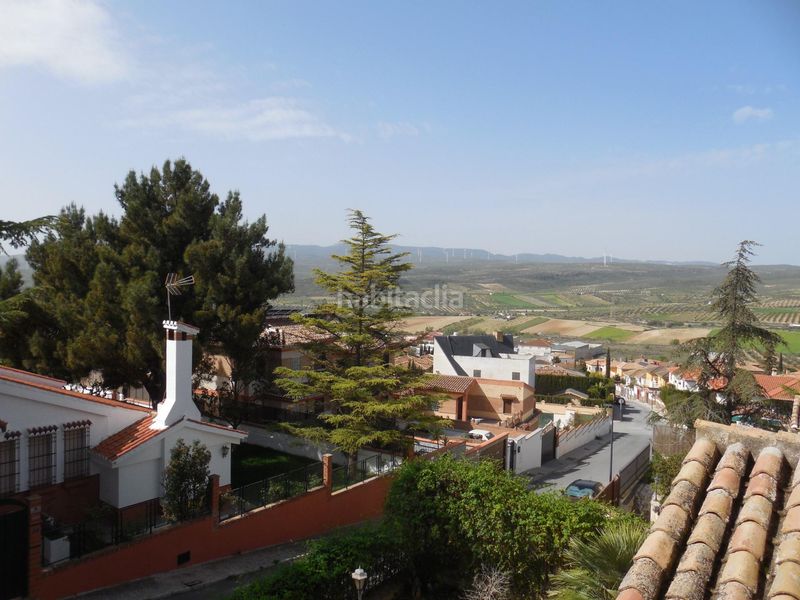 Foto 1e5e87e2-1cea-4e63-aa86-18918d83c93d. Casa pareada  con jardín y piscina en el puntal en Padul